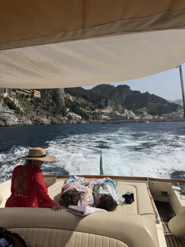 Family on a private boat heading to Amalfi